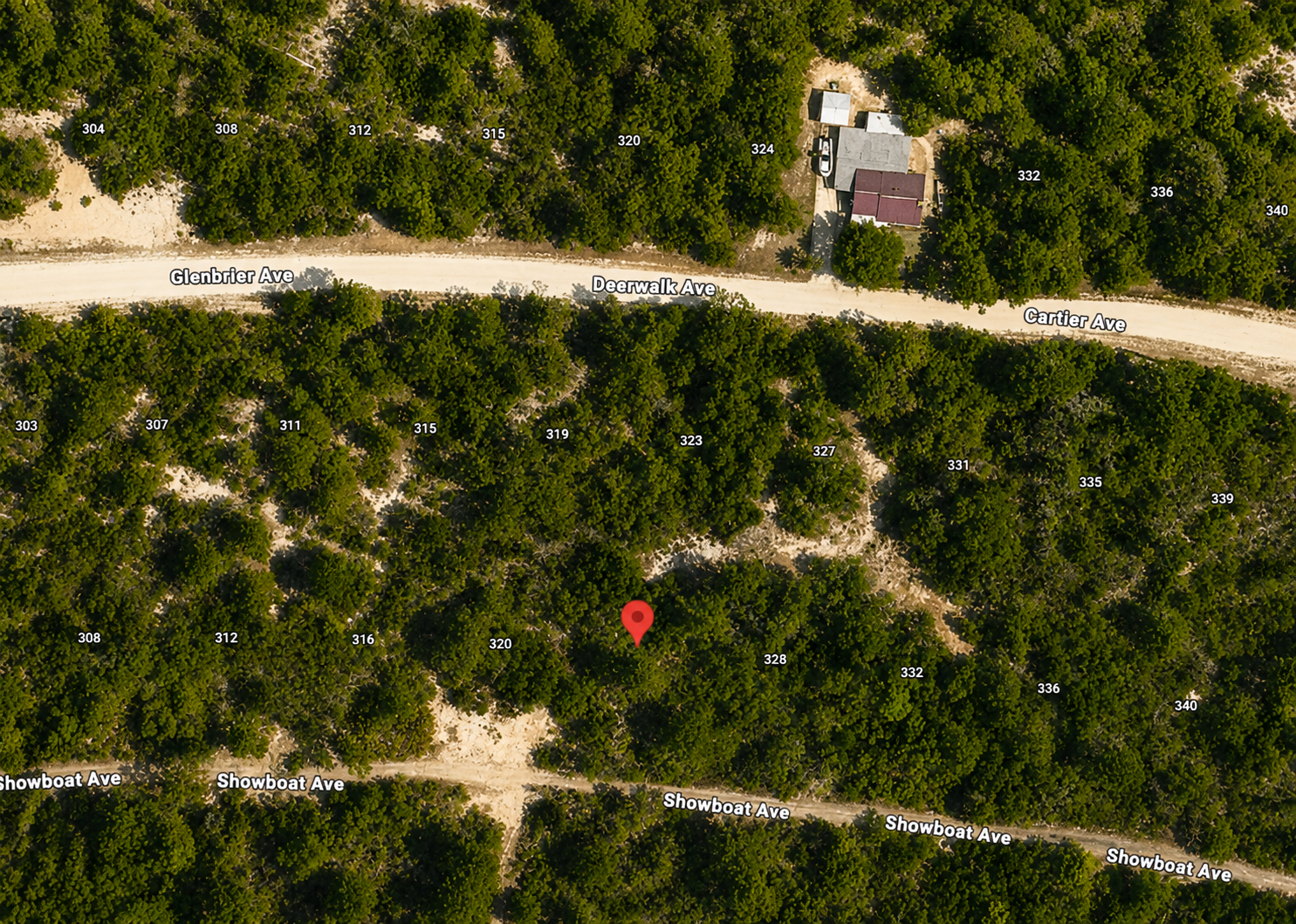 Anchor Your Dreams on Showboat Ave: 0.23 Acres of Wooded Serenity